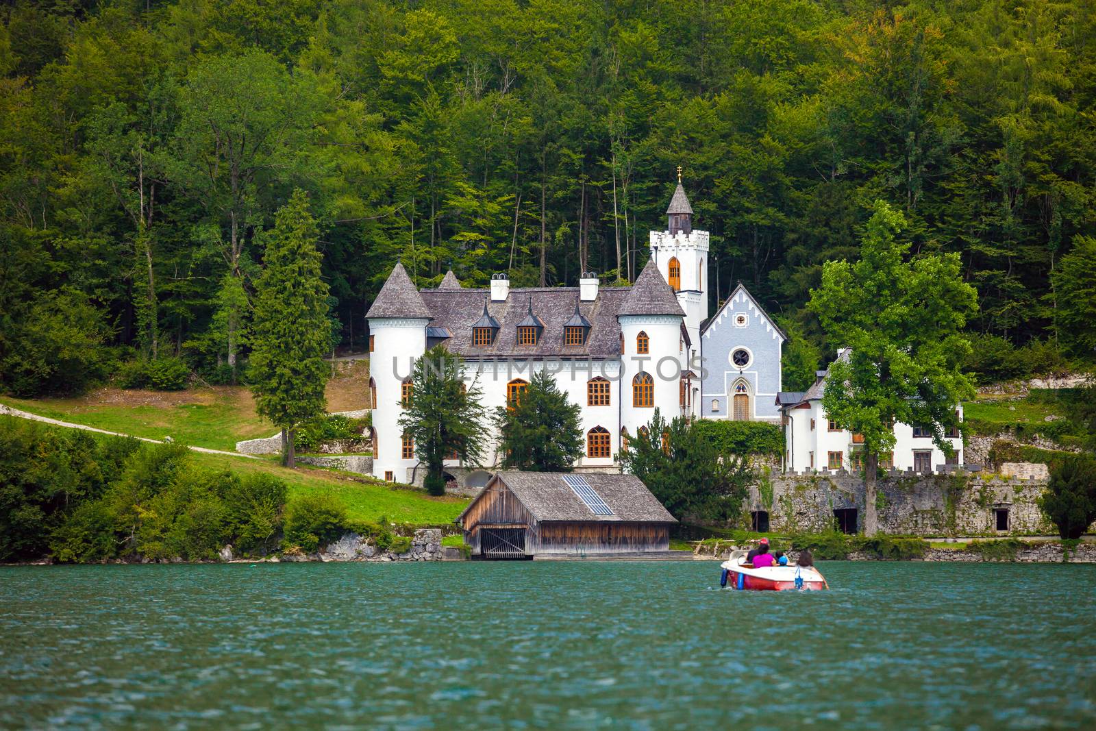 Hallstatt, Austria - August 7, 2013: Castle on Hallstatt lake shore, Austria