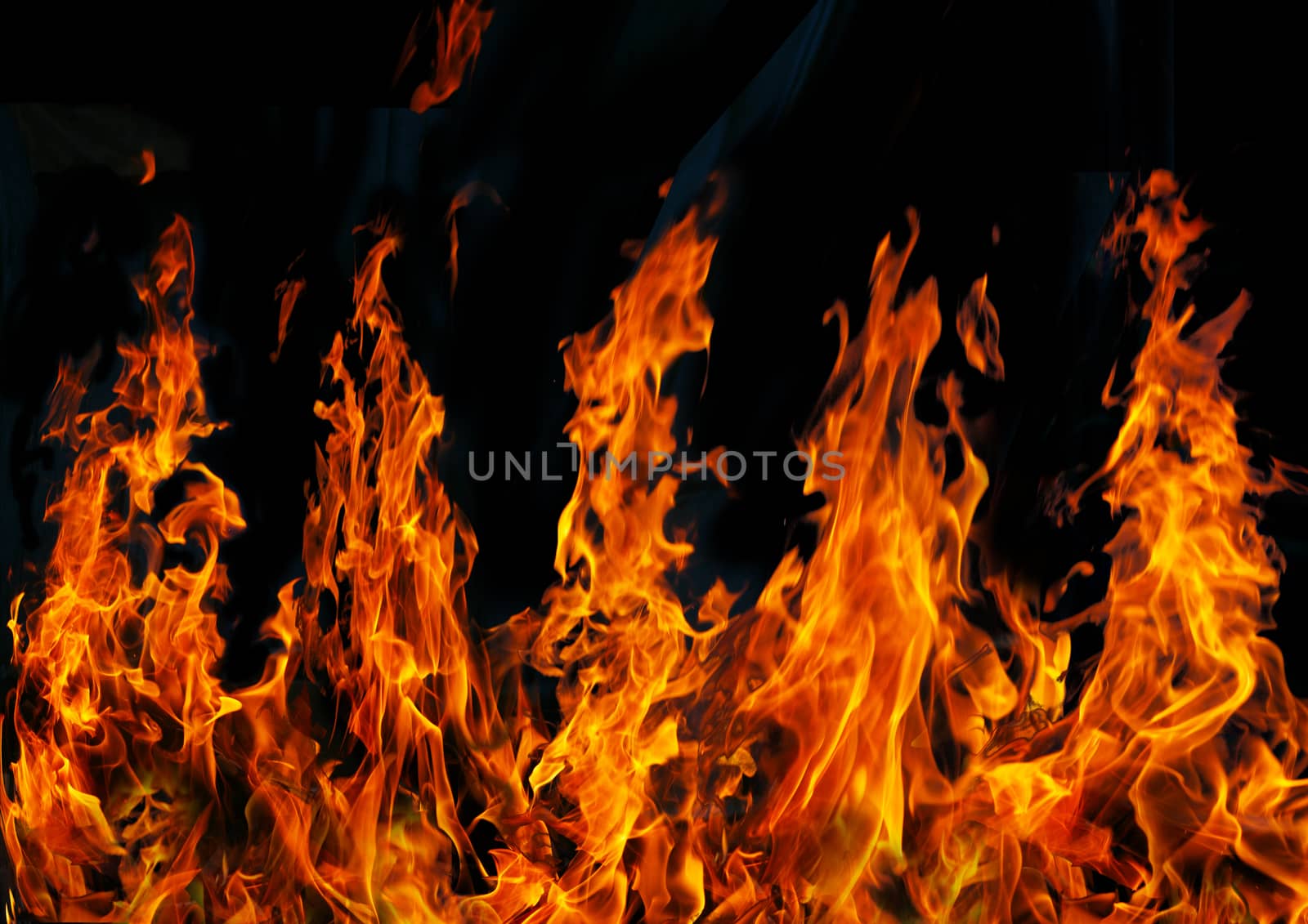 Five hot red fires on  black background