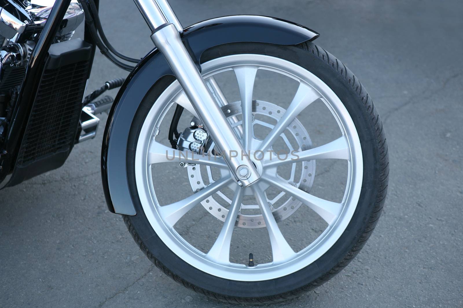 forward wheel of big powerful motorcycle