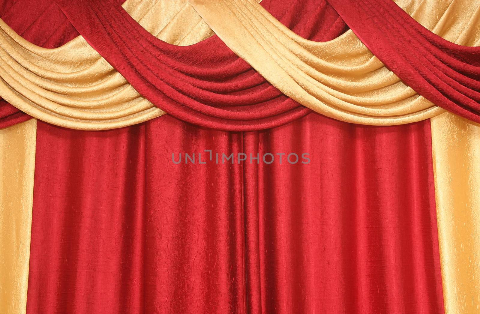draped curtain of red and yellow colour