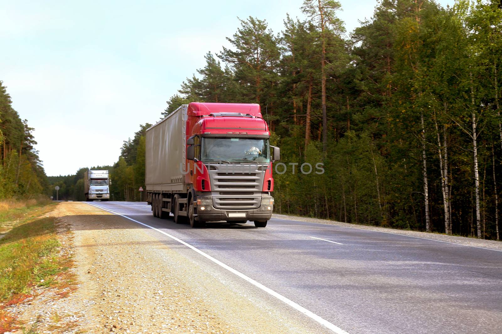 Two trailers go on highway  by yurii_bizgaimer