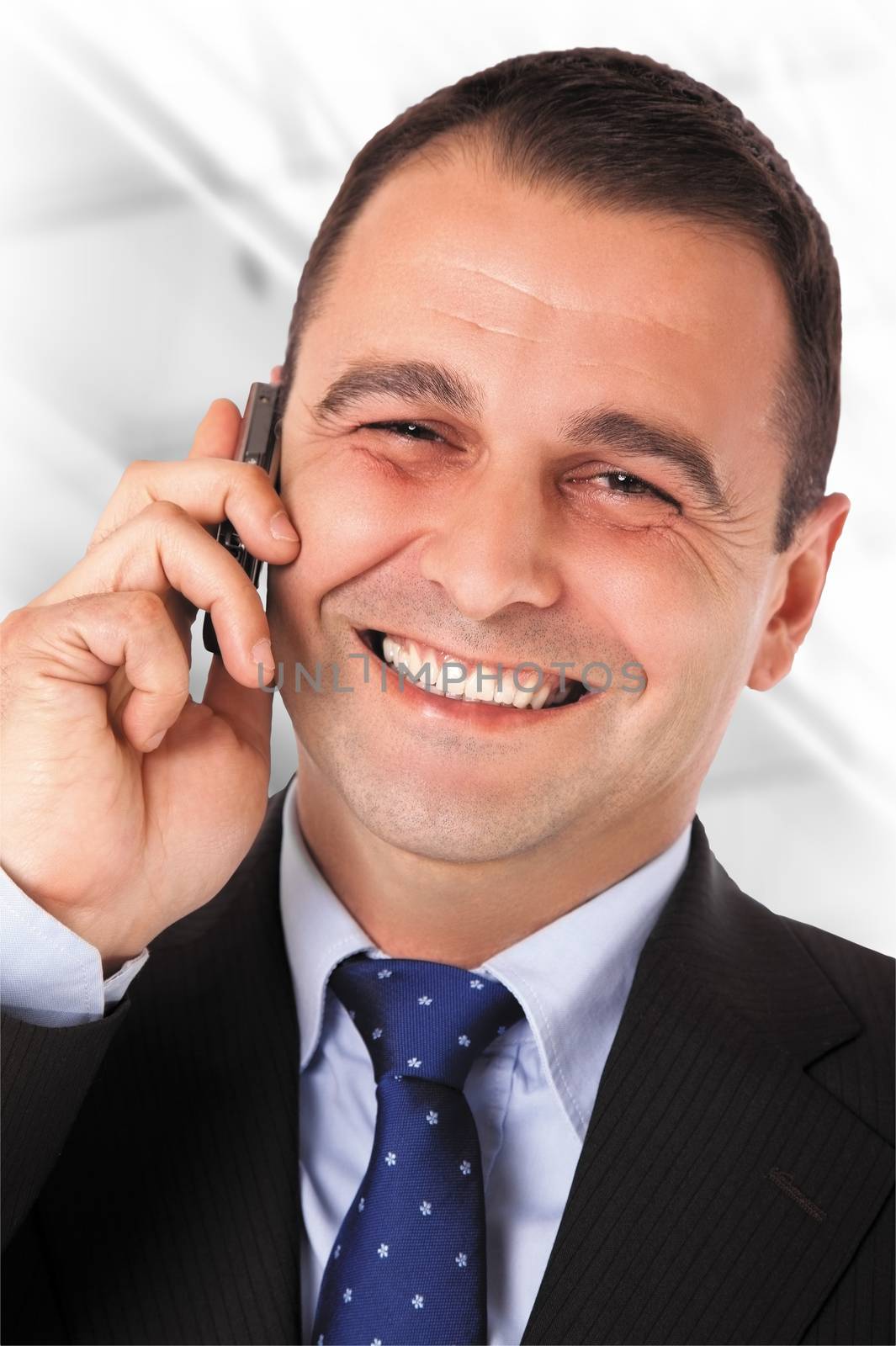 Happy bussinessman with suit speaking on telephone. Isolated Work Path
