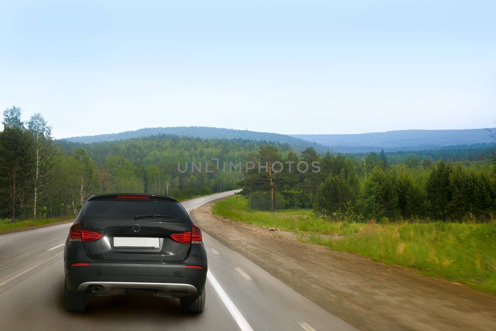 car goes on country road  by yurii_bizgaimer