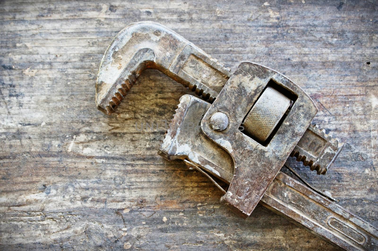 Old Rustic Wrench on Wood by RichieThakur