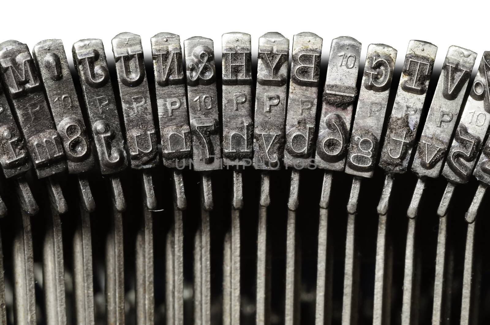 Close-up of vintage typewriter letter &  symbol keys by Balefire9