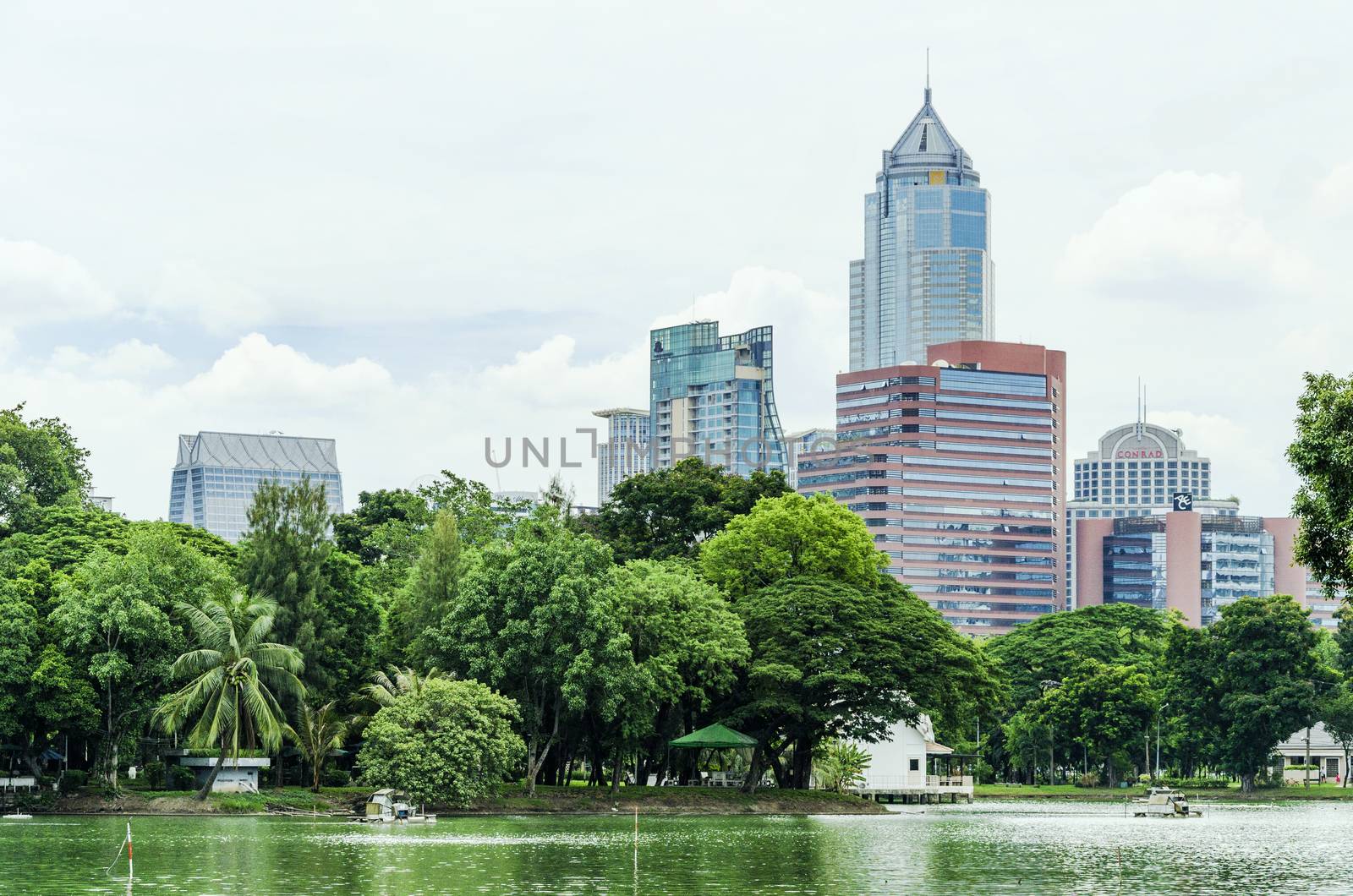 BANGKOK - july 3: Lake view of Lumpini Park in the Thai capital' by siiixth