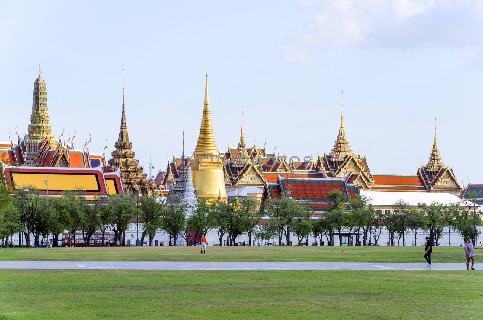 BANGKOK,THAILAND - JULY 3: Wat Phra Kaew, Grand Palace, Bangkok. View from the lawn or Sanam Luang, July 3, 2014 in Bangkok,Thailand
