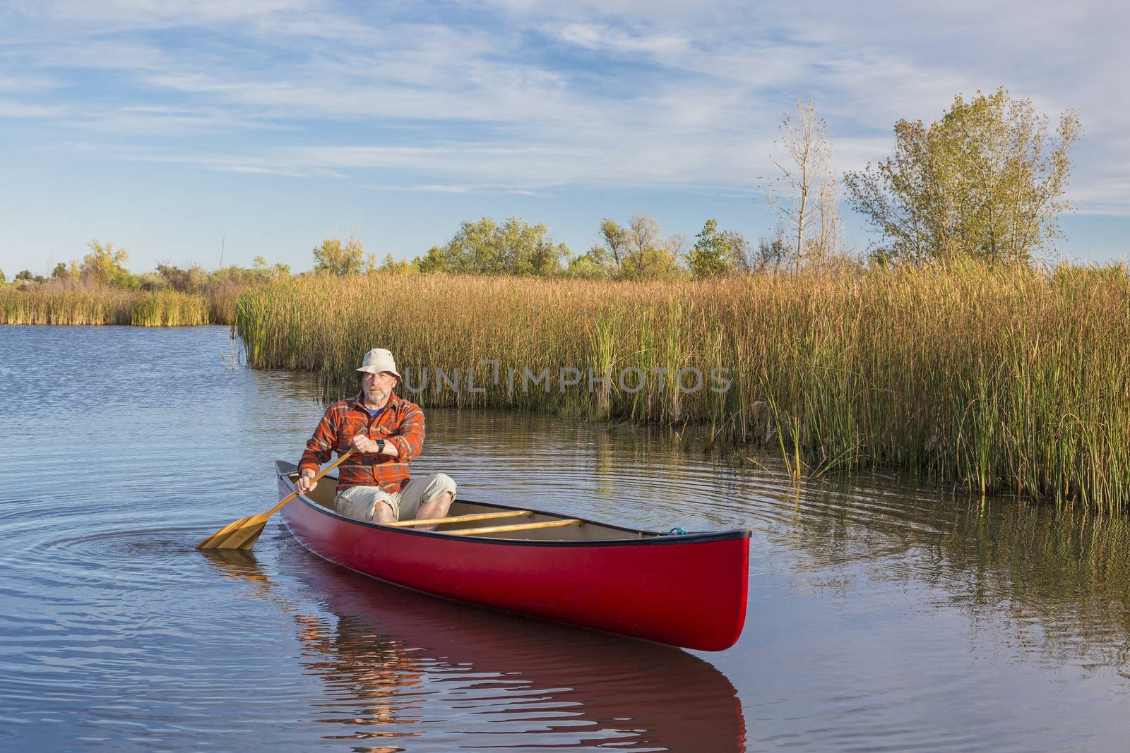 afternoon canoe paddling by PixelsAway