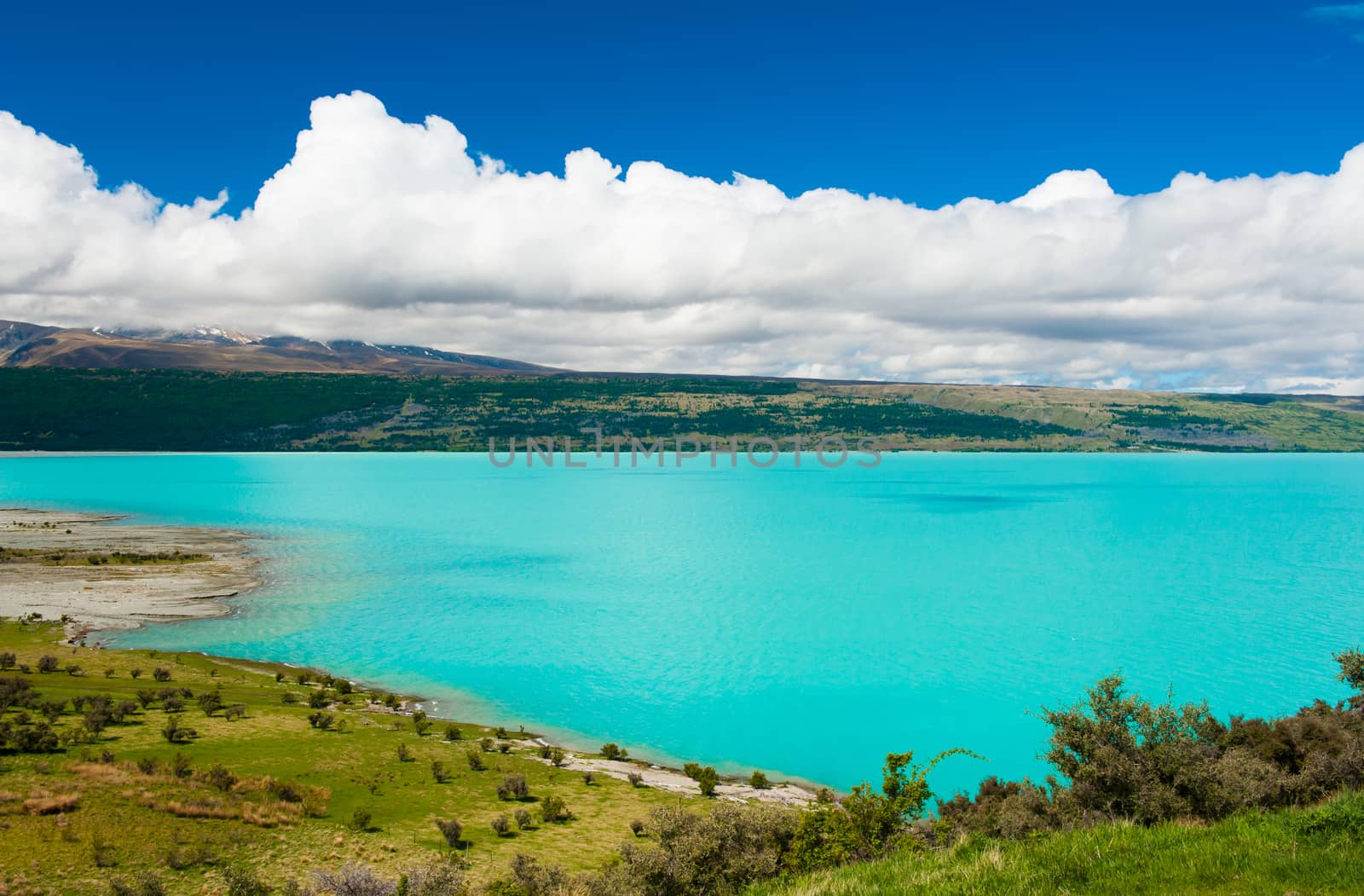 Beautiful incredibly blue lake Pukaki at New Zealand