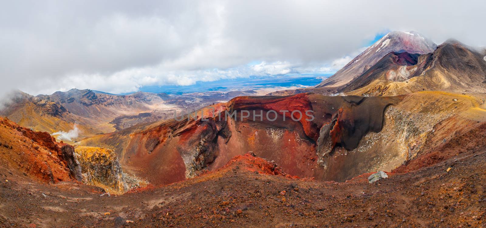 Panoramic photo of the Red Crater on the top of Tongariro Volcano with a Mount Ngauruhoe in the back, Tongariro Crossing National Park - New Zealand