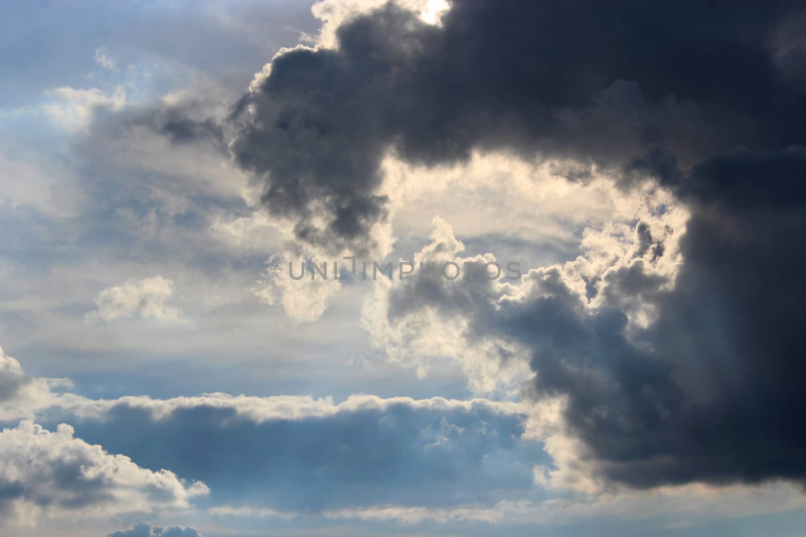 cloud with unusual shape and sunny beams