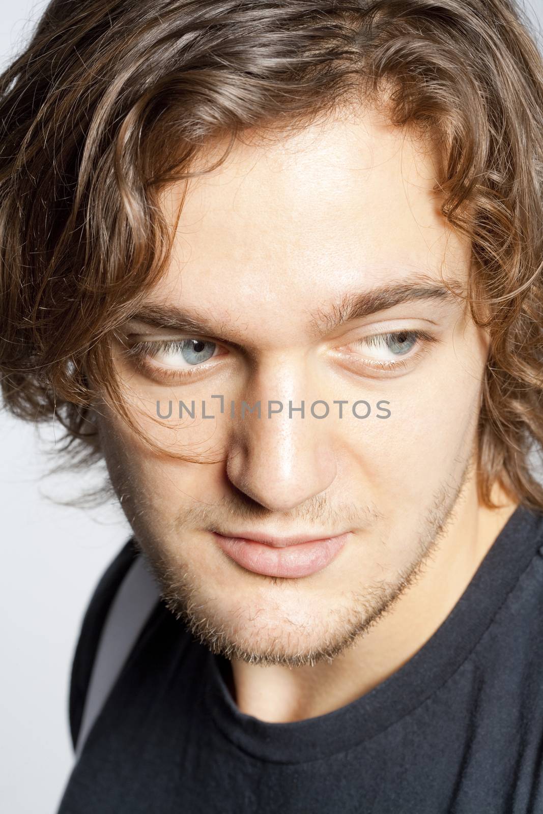 Closeup Portrait of a Young Man with Brown Hair.