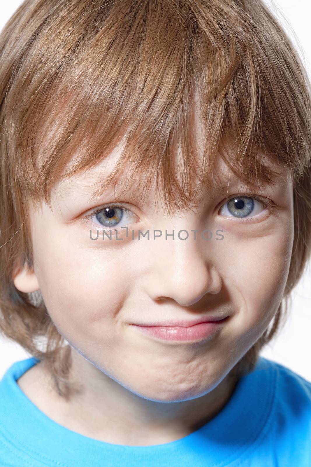 Portrait of a Boy with Blond Hair Looking - Isolated on White