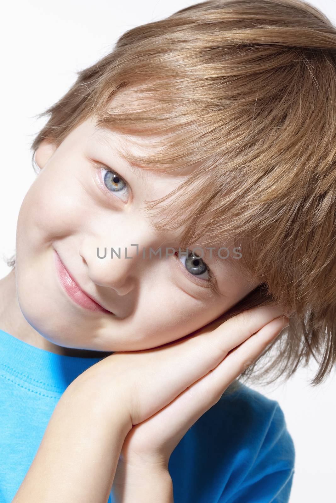 Portrait of a Boy with Blond Hair Looking - Isolated on White