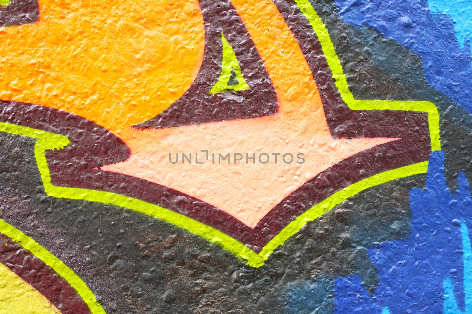Colourful drawing of graffiti on concrete wall