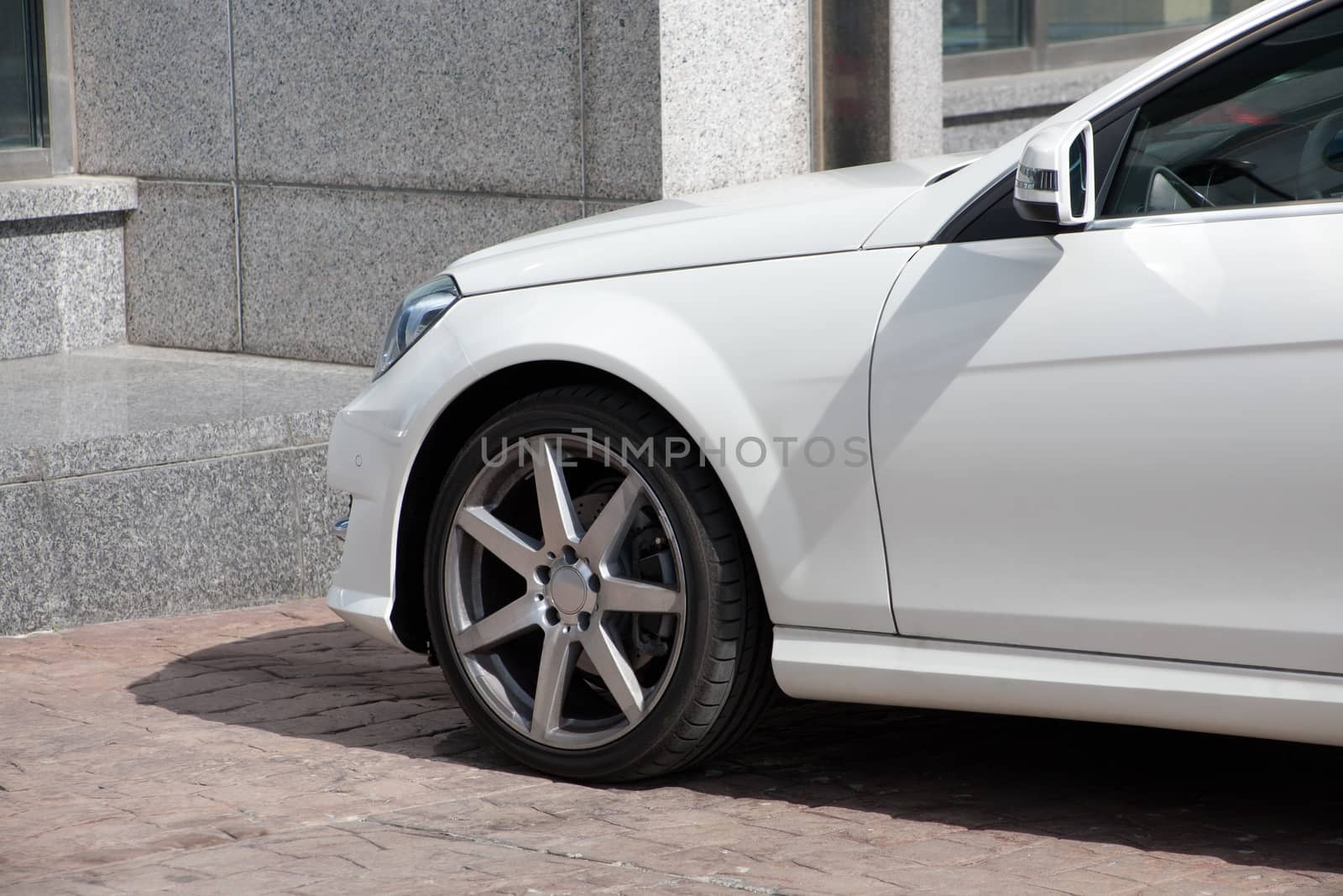 white prestigious car at granite steps