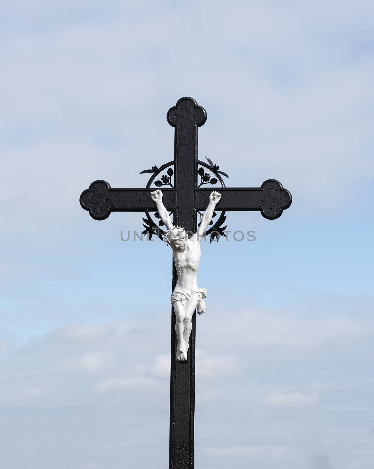 religion cross with jesus on gravejard