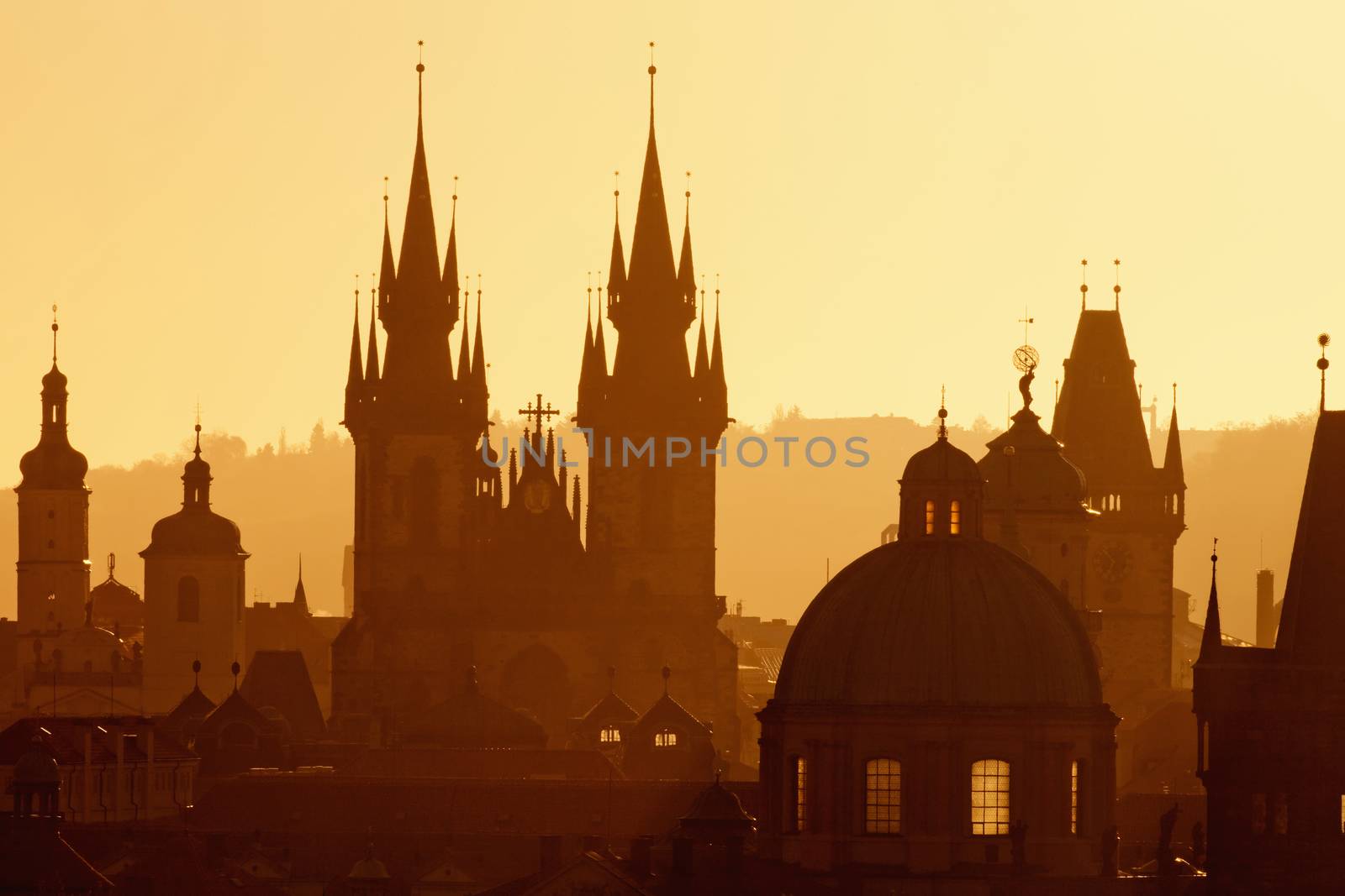 czech republic, prague - spires of the old town and tyn church at sunrise