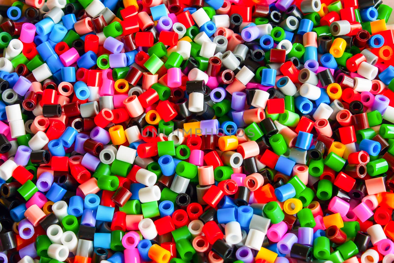 multicolored plastic hama beads toy for kids by Havana