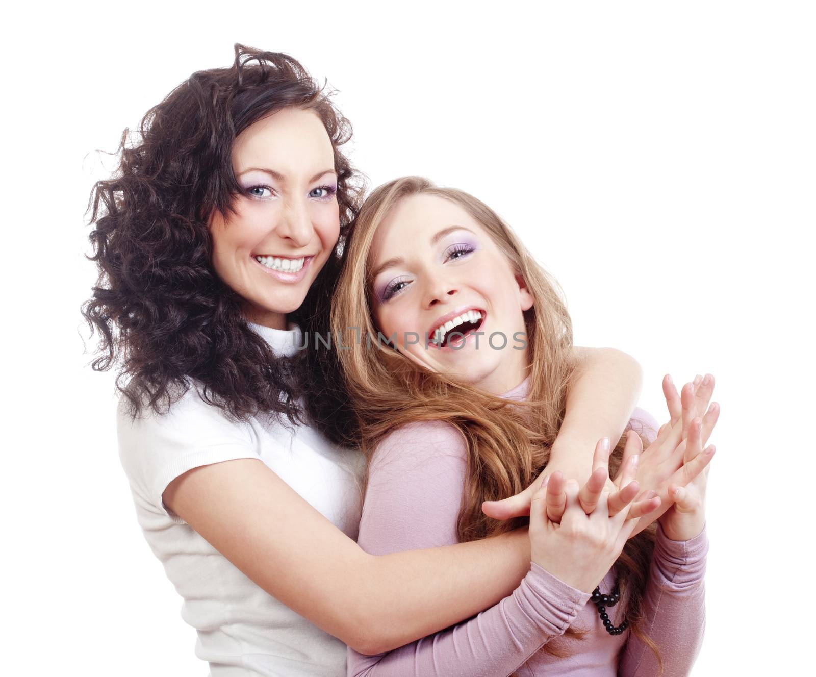 two young female friends having fun - isolated on white