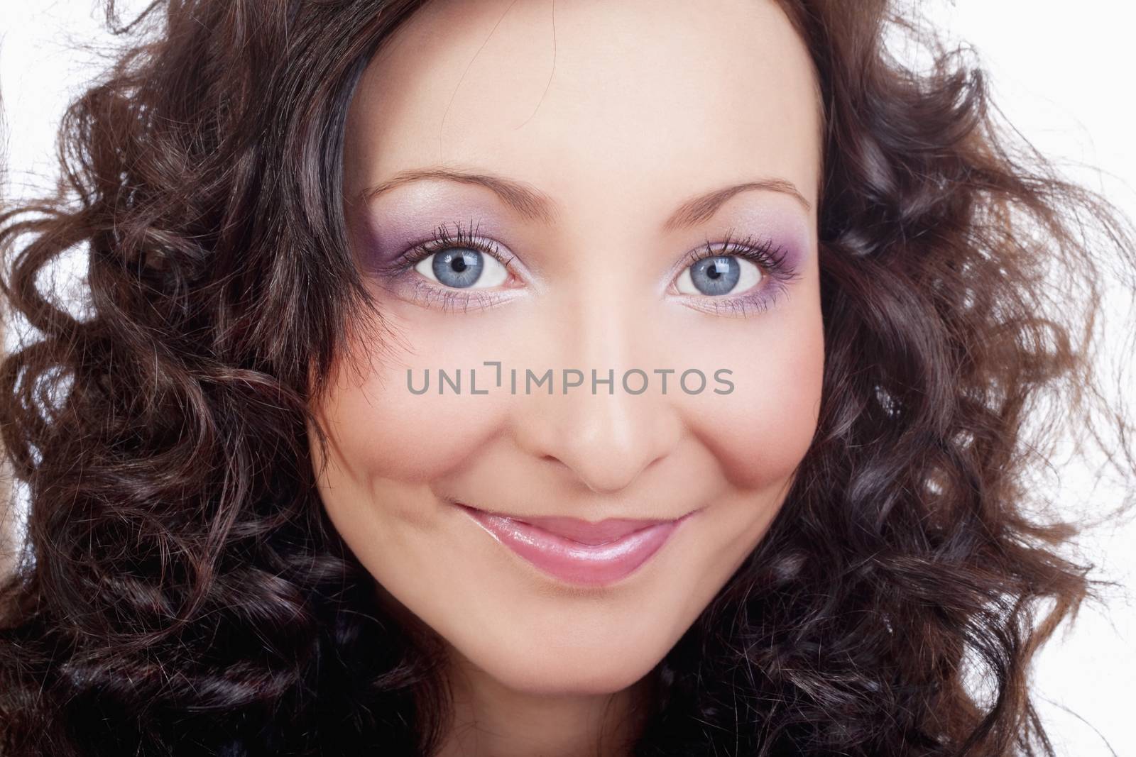 portrait of a beautiful young woman with big blue eyes - isolated on white