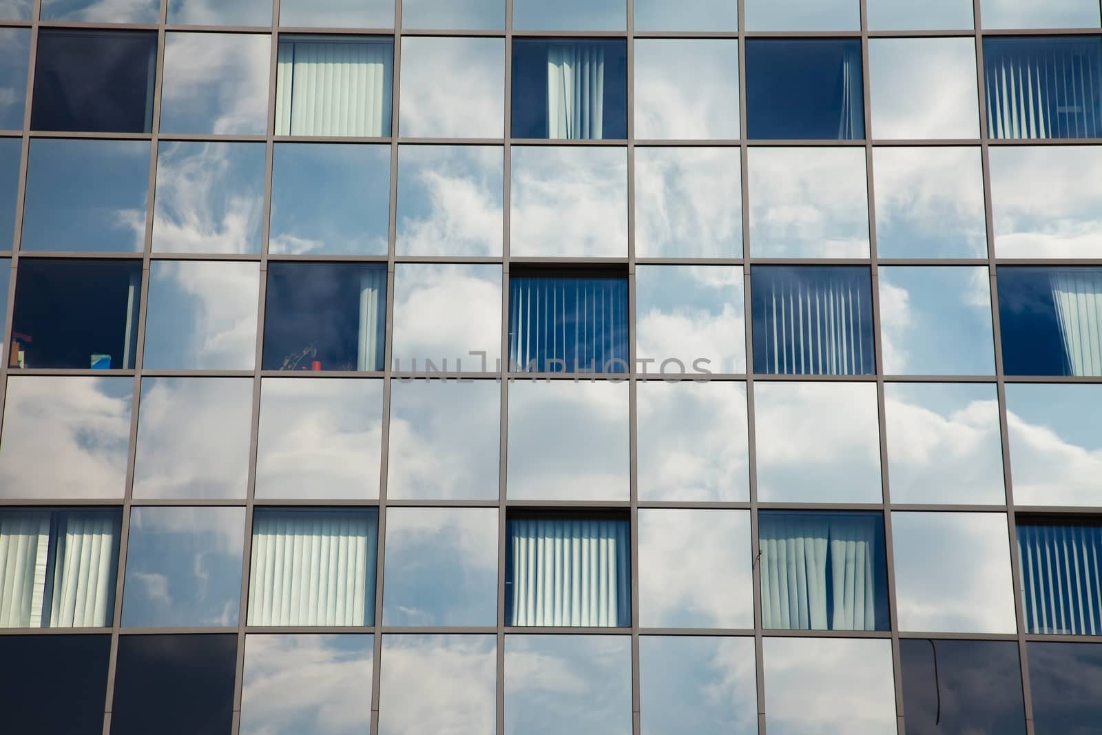 Modern office building detail, glass surface