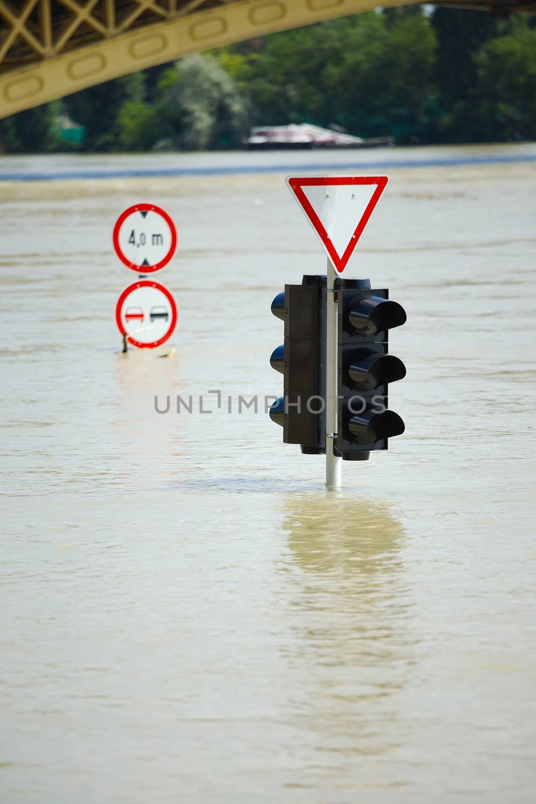 Flooded street n Budapest with traffic sign