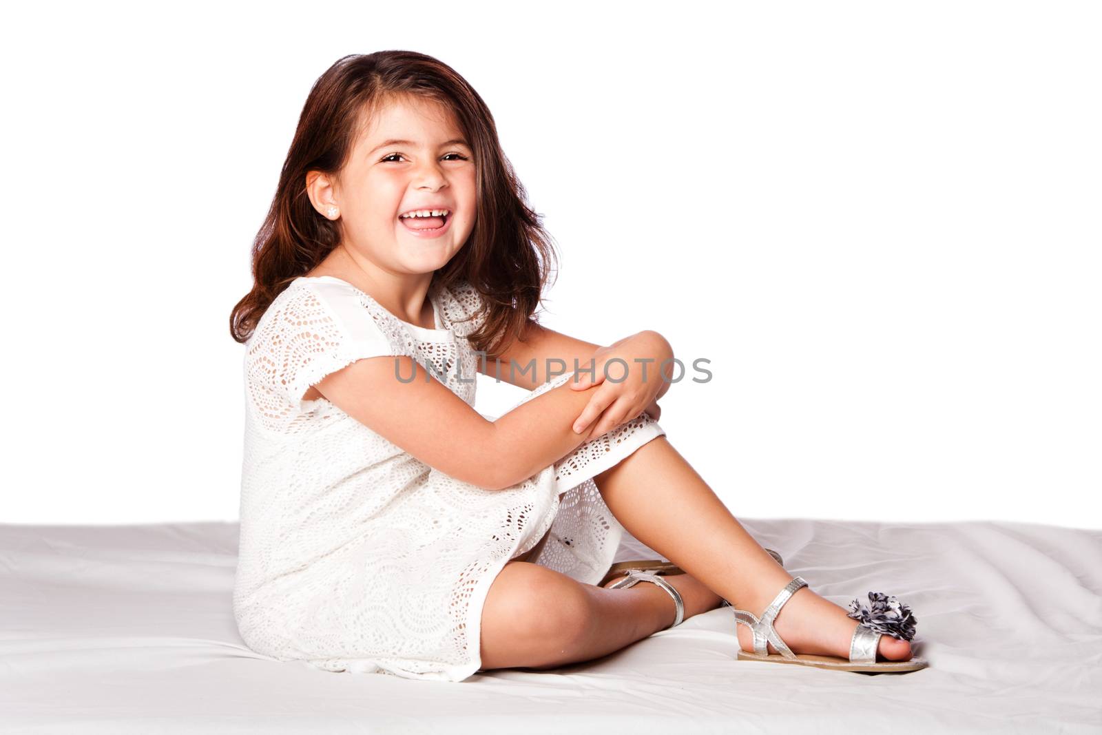 beautiful cute happy smiling girl sitting, on white.