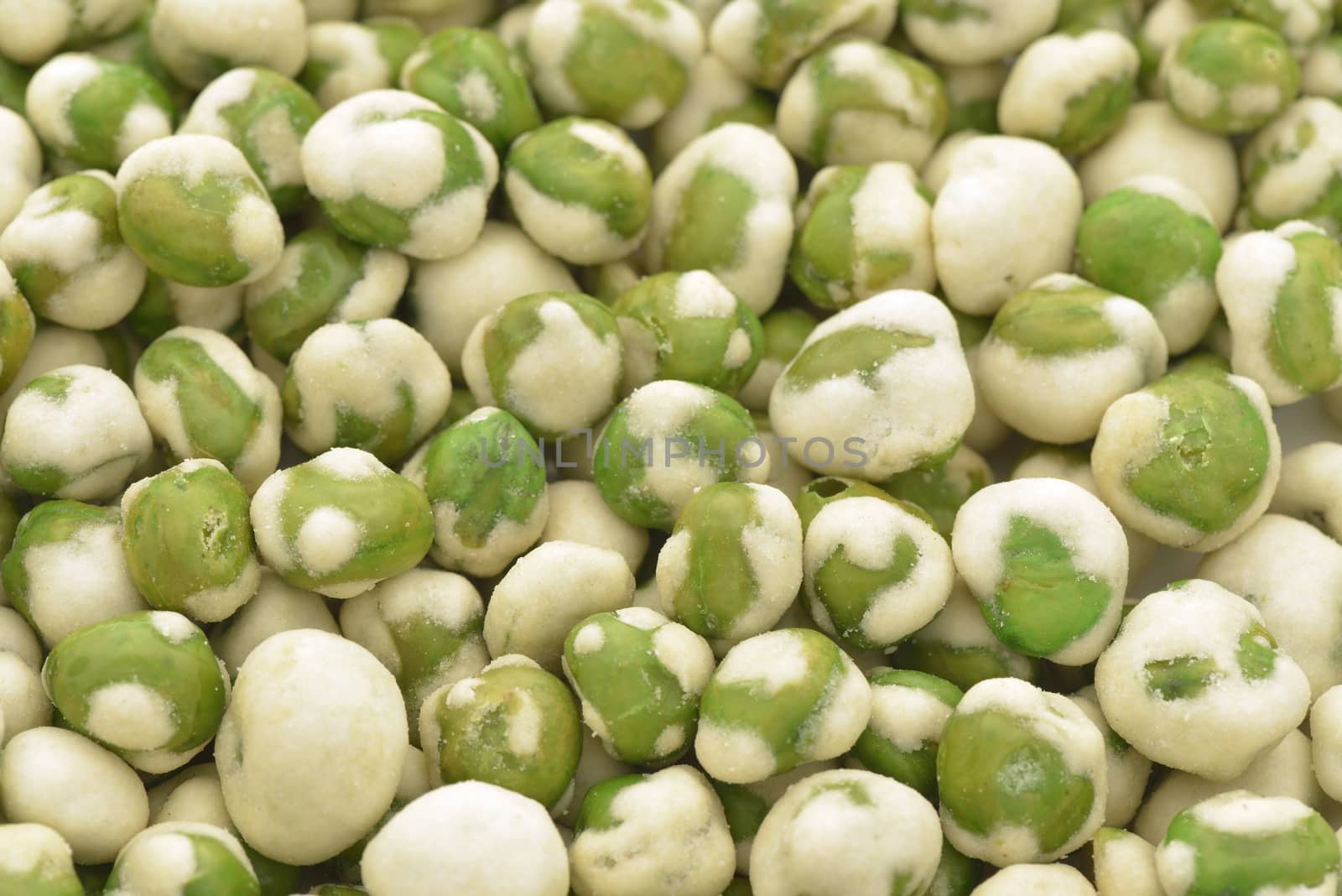 Close-up of white and green wasabi peas