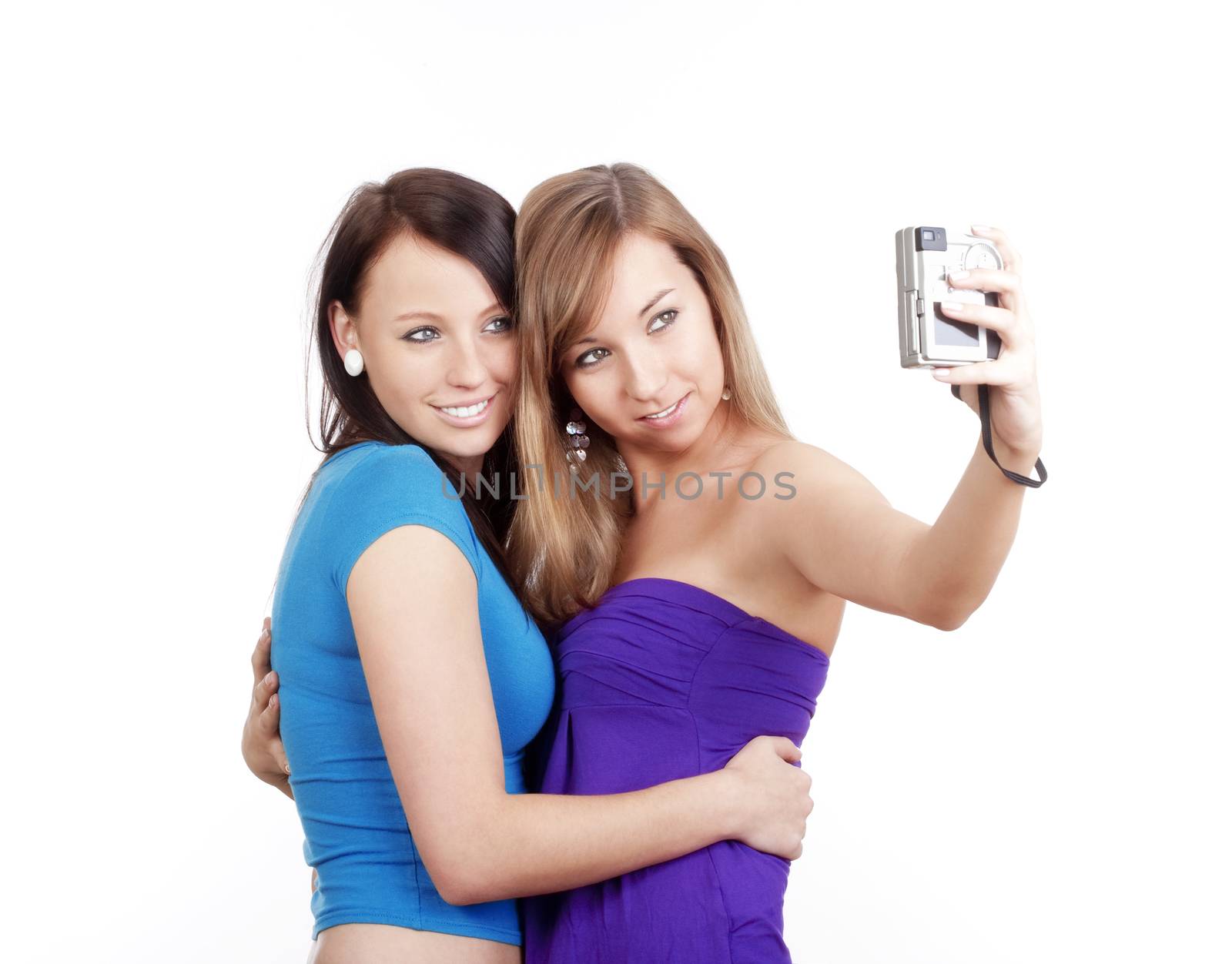 young women taking picture by courtyardpix