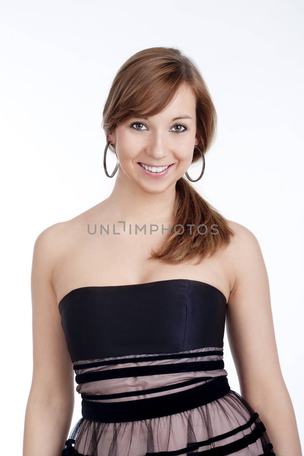 young woman smiling by courtyardpix