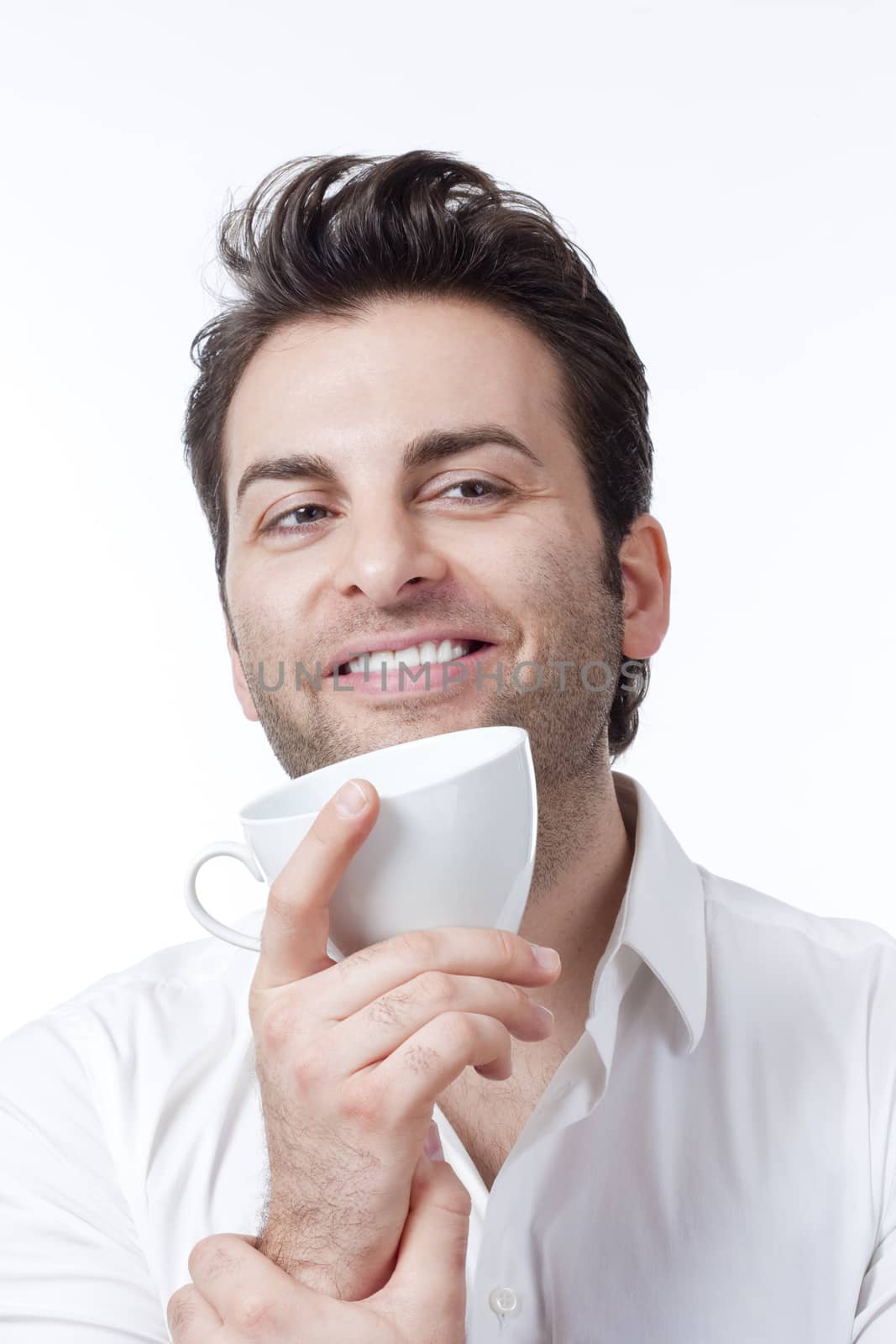 man holding cup of coffee by courtyardpix