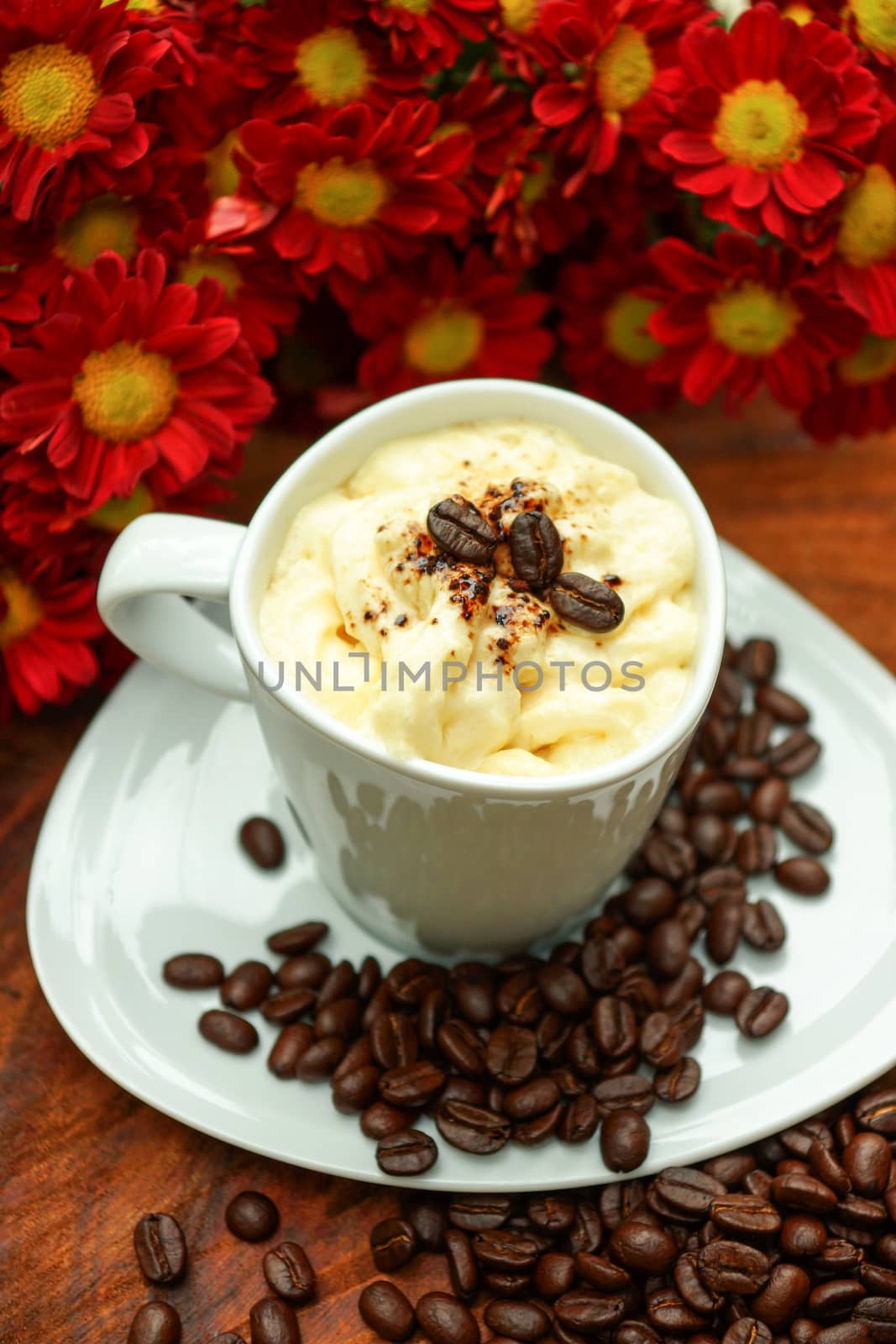 Espresso con panna coffee and Red chrysanthemum flower