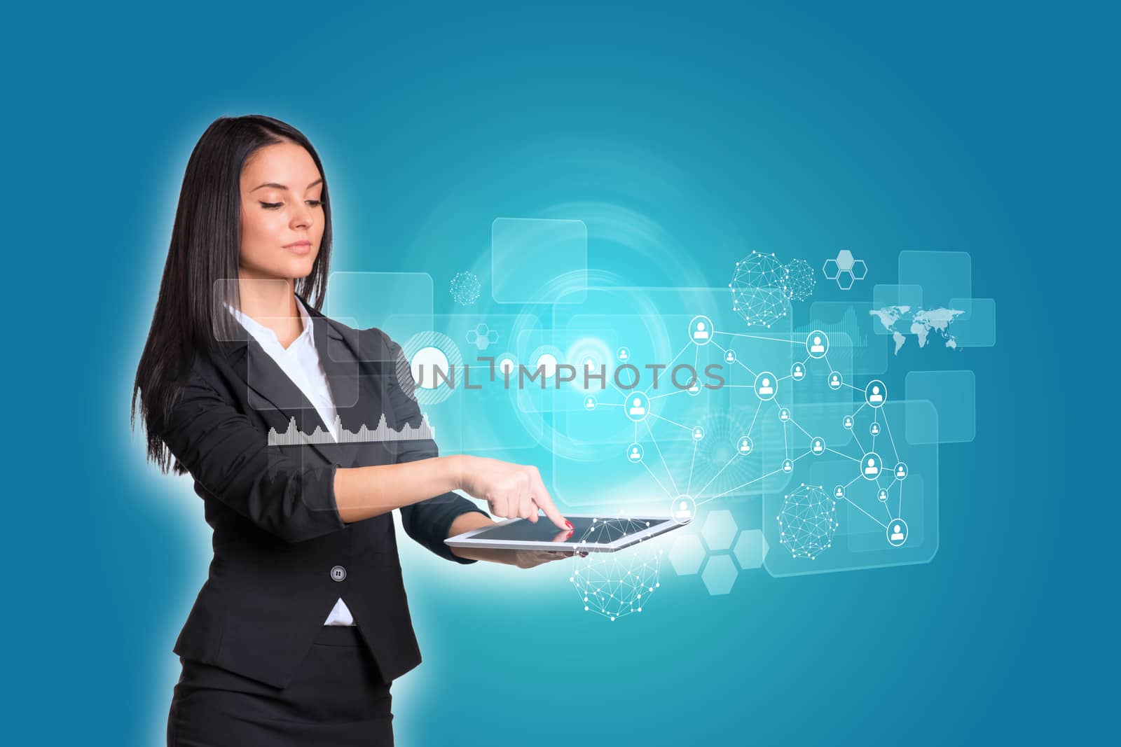 Beautiful businesswomen in suit using digital tablet. Glow circles, transparent rectangles, graphs and network