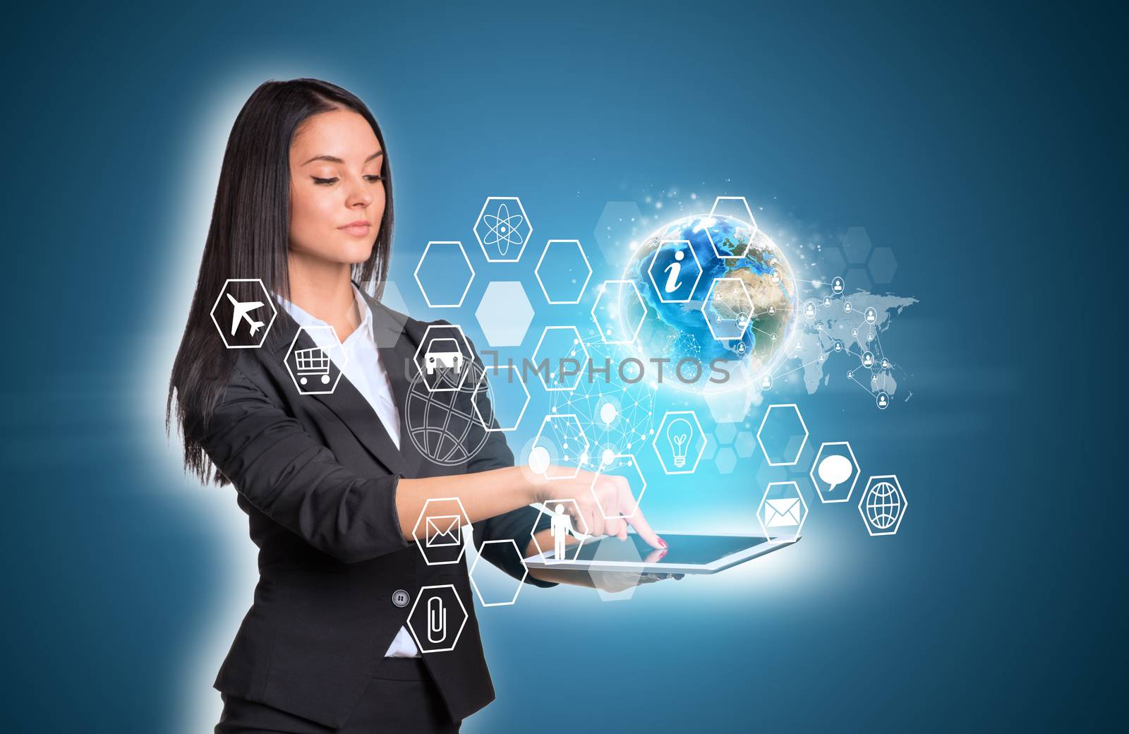 Beautiful businesswomen in suit using digital tablet. Earth and transparent hexagons with icons. Element of this image furnished by NASA