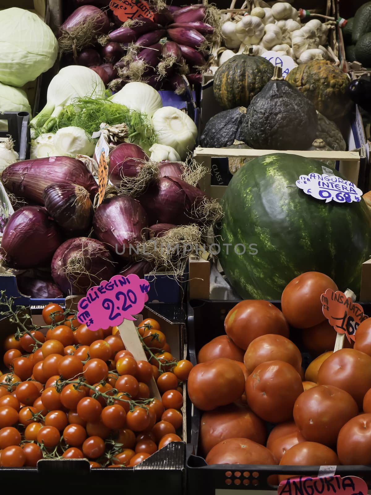 Raw vegetables and fruits in a corner market in Italy
