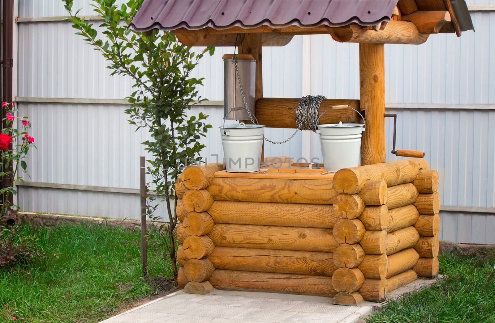 Beautiful well-planned wooden kolody with buckets.