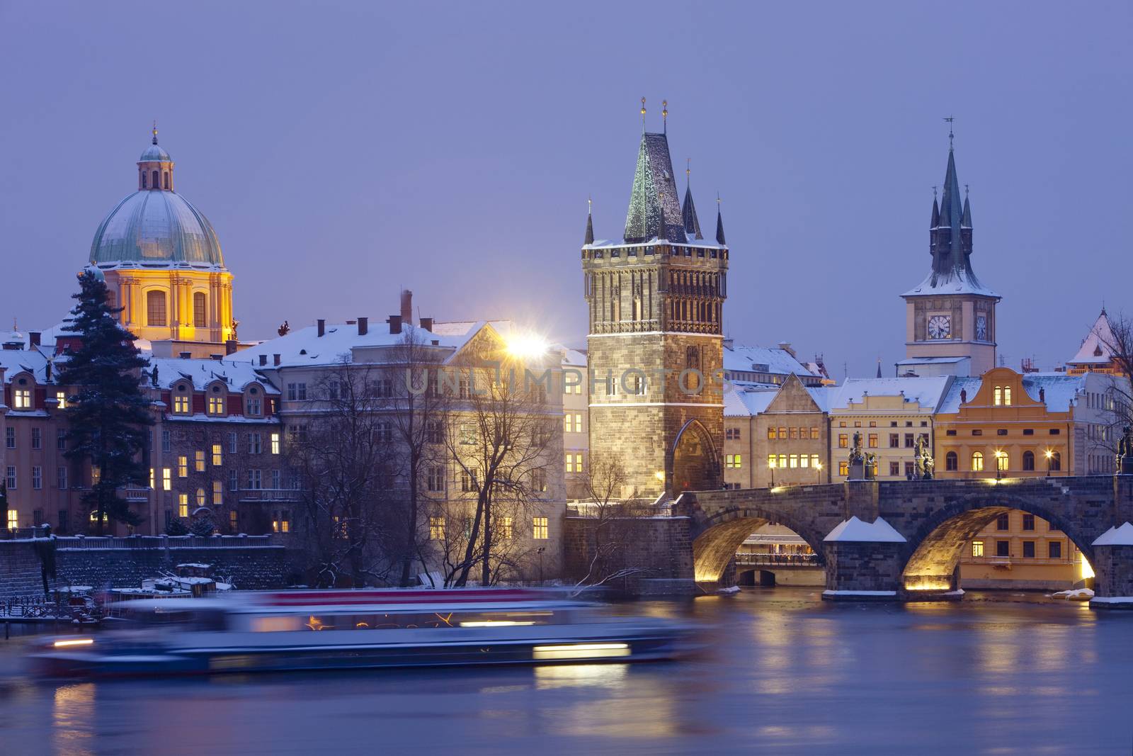 czech republic prague - charles bridge and spires of the old town at dusk