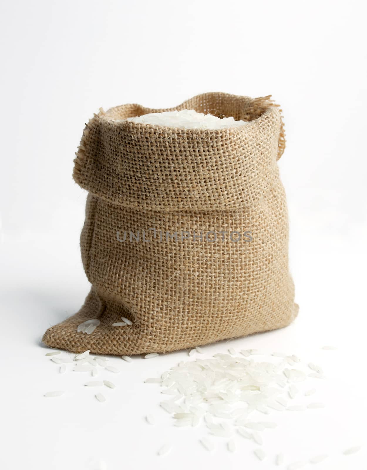 rice in burlap sack by antpkr