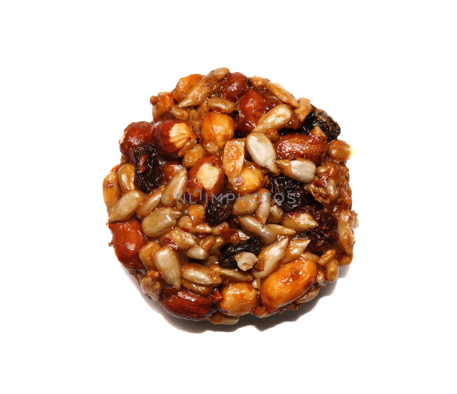 Kozinaki (national Georgian sweetness - nuts in honey) is isolated                                