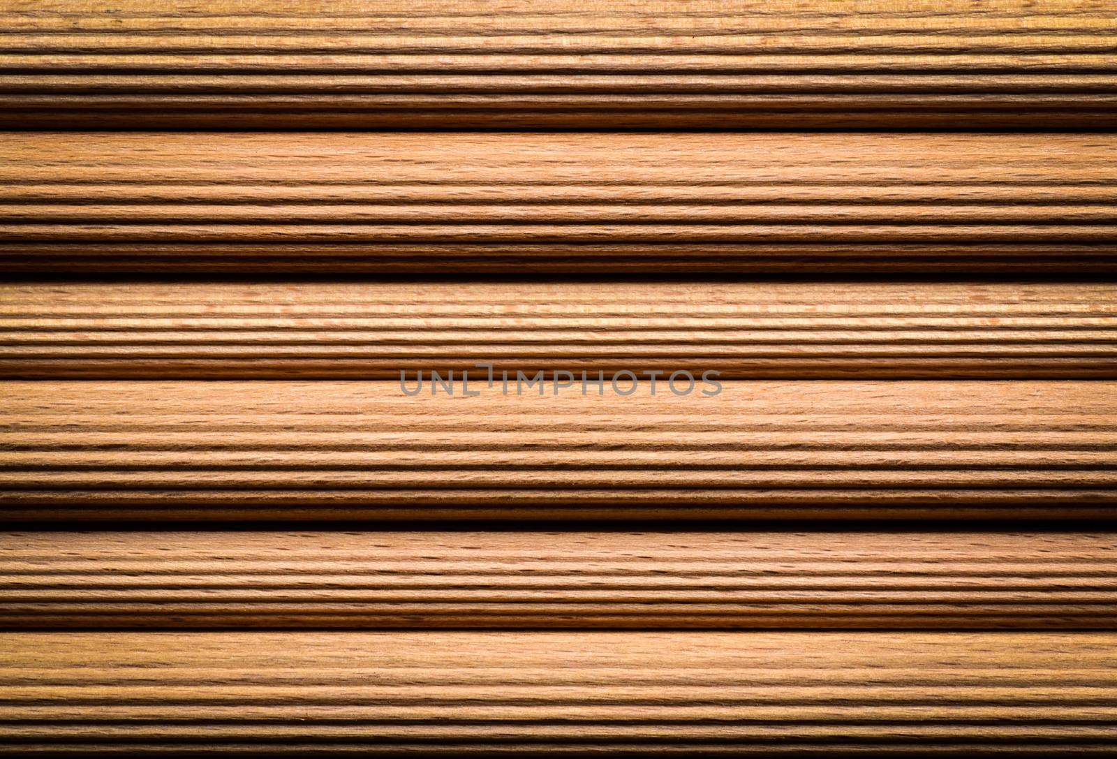 background or texture notched wooden sticks with hardwood