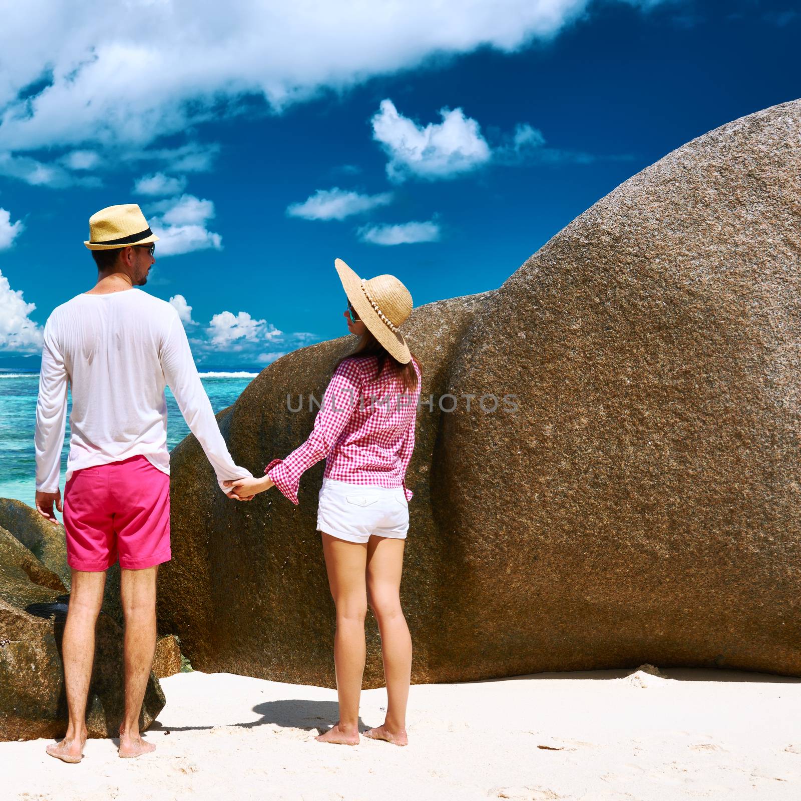 Couple on a tropical beach at Seychelles