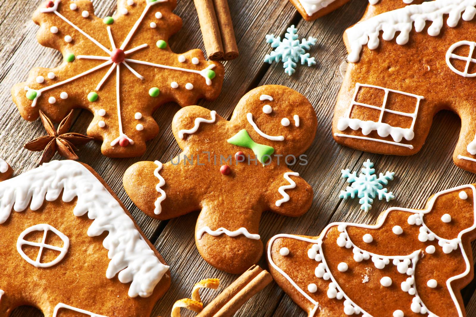 Christmas homemade gingerbread cookies on wooden table