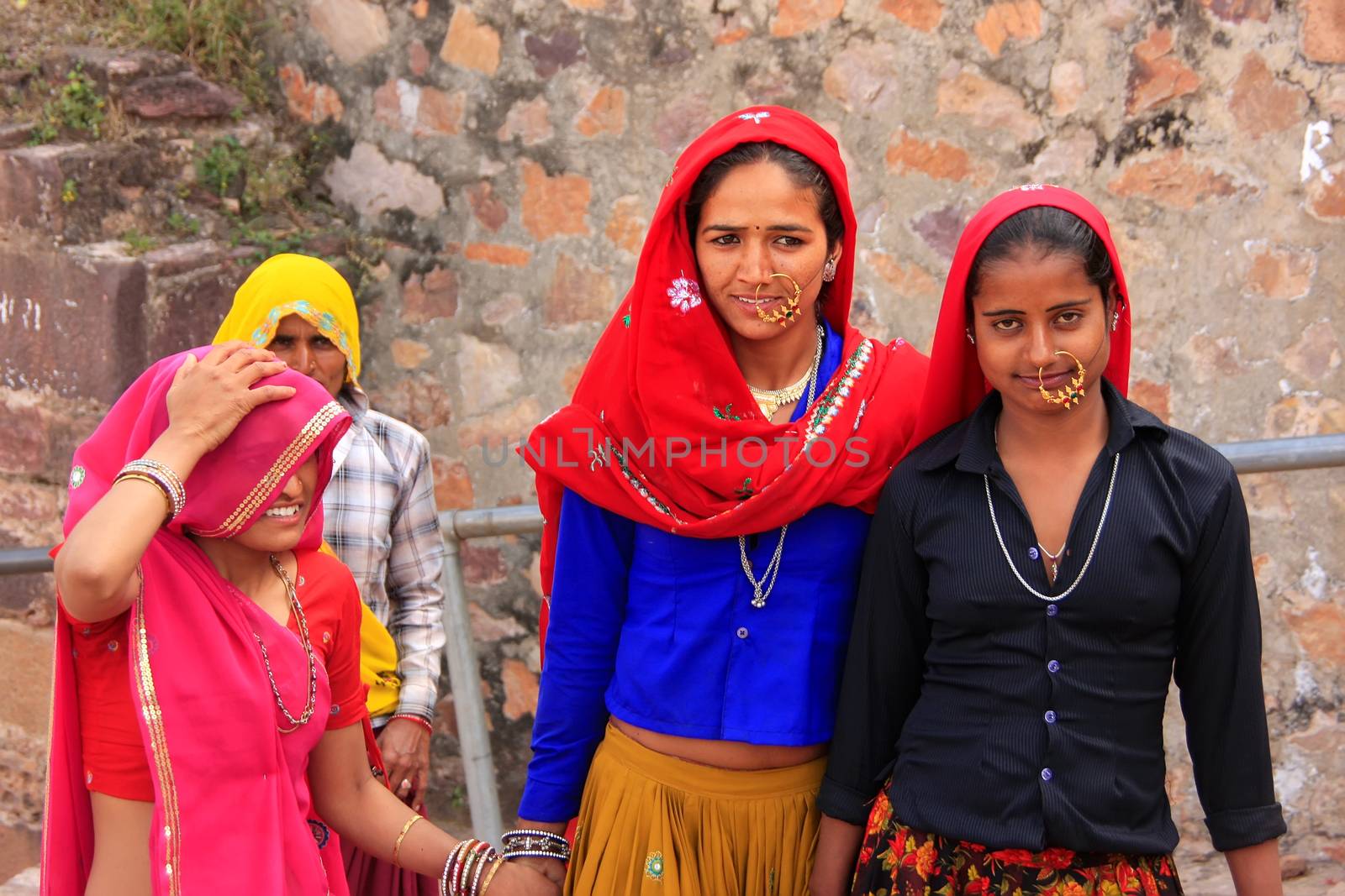 Indian women in colorful saris walking up the stairs at Ranthambore Fort, Rajasthan, India