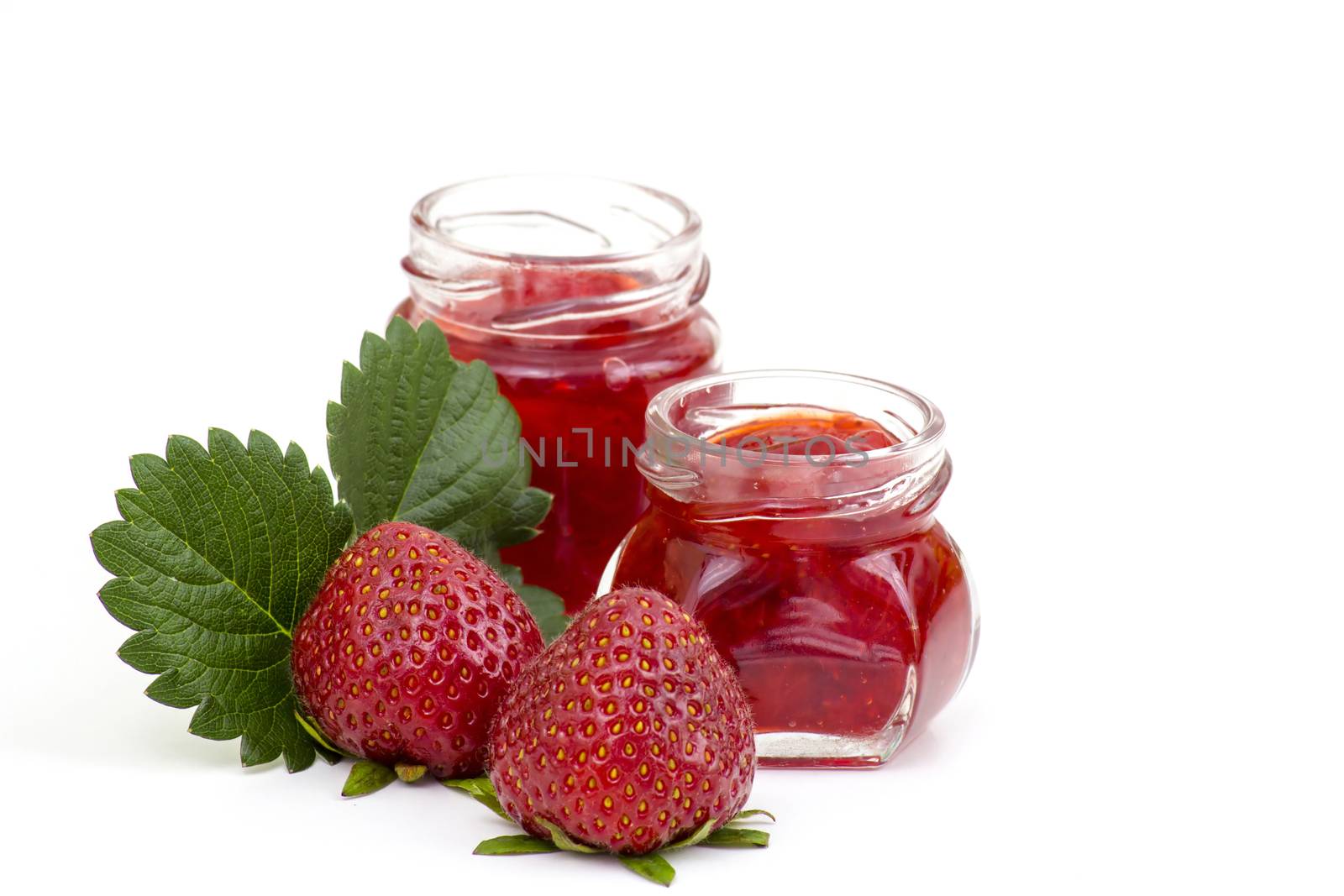 Strawberry jam with fresh strawberries