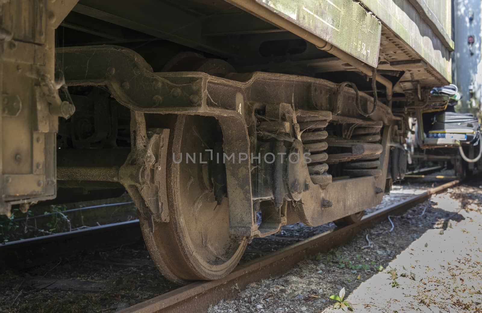 old rusted dirty wheels from train on railroad in hombourg belgium