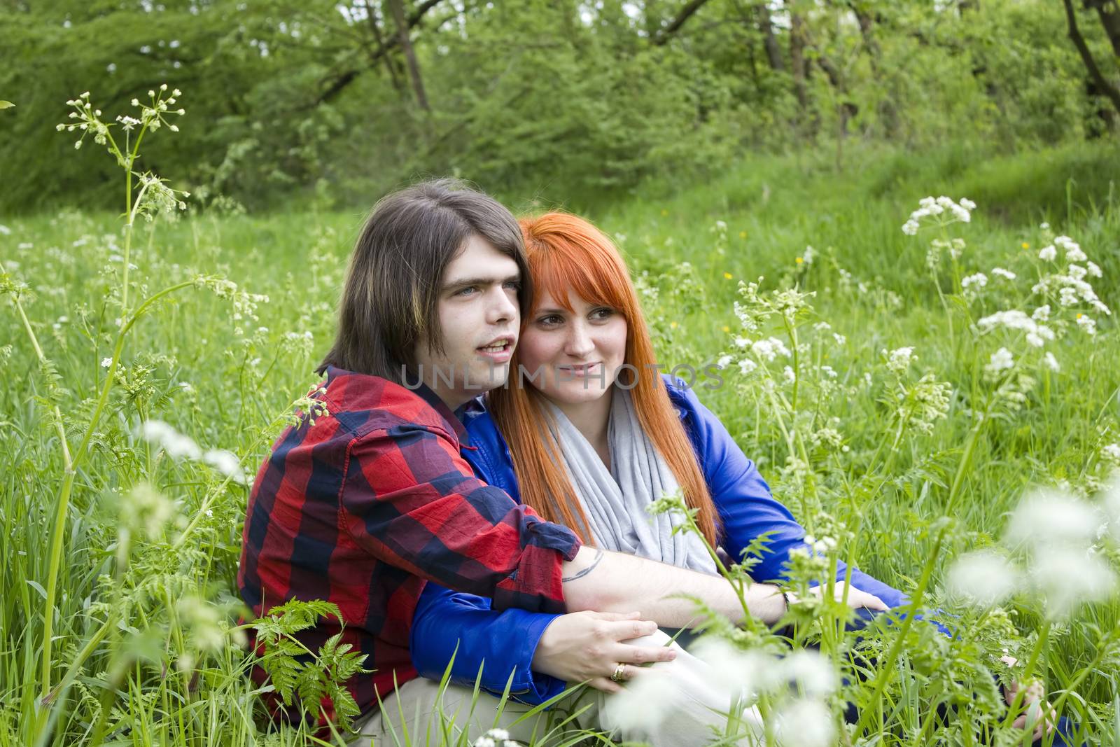 Portrait of love couple outdoor in the park 