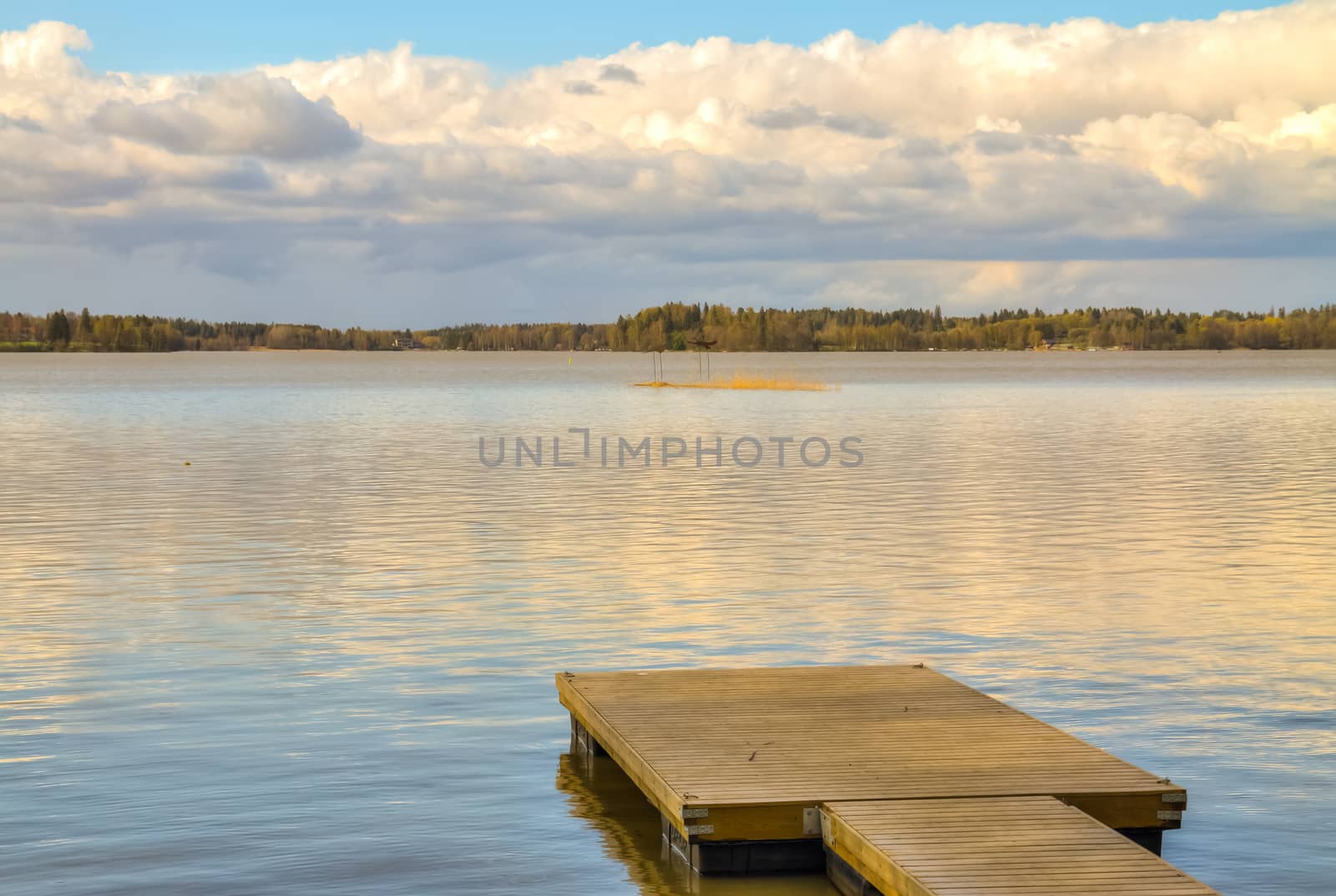 Wooden pier in the lake by Alexanderphoto
