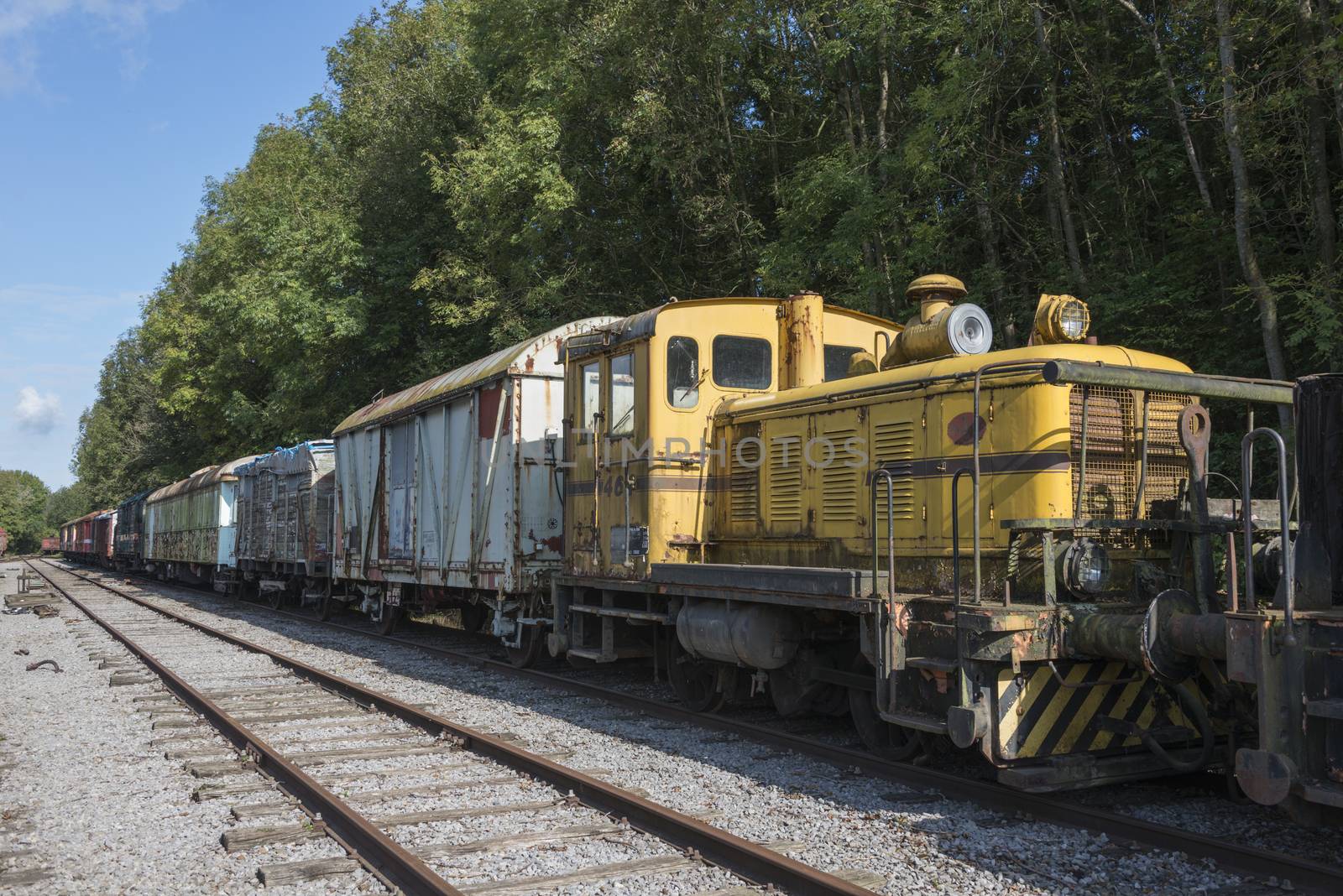 old rusted train with locomotive at trainstation hombourg by compuinfoto