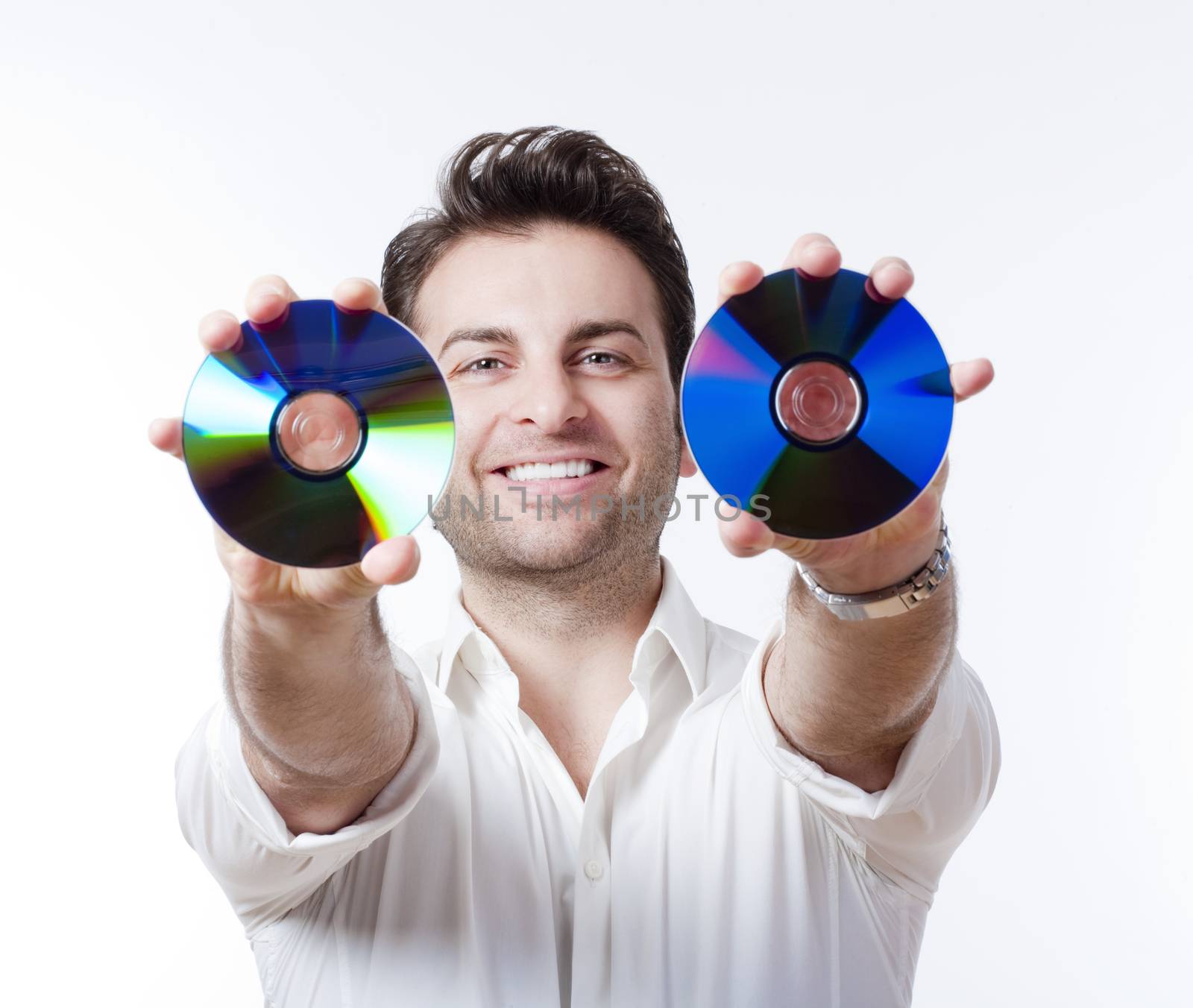 man in shirt standing smiling holding CD - isolated on white